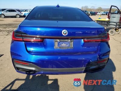 Zdjęcie 6 z 12 samochodu: 2021 BMW 750 XI VIN:WBA7U2C07MCE93142 - miniatura