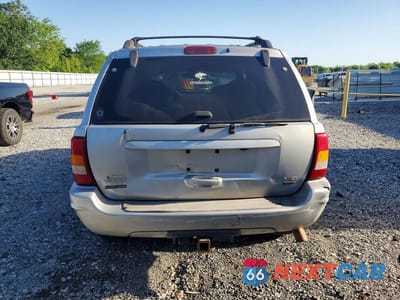 Zdjęcie 6 z 13 samochodu: 2003 JEEP GRAND CHEROKEE OVERLAND VIN:1J8GW68J93C532310 - miniatura