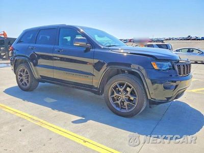 Czwarte zdjęcie samochodu z boku: 2021 JEEP GRAND CHEROKEE LIMITED VIN:1C4RJFBG4MC580195 - miniatura