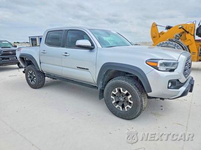 Czwarte zdjęcie samochodu z boku: 2023 TOYOTA TACOMA TRD OFF-ROAD VIN:3TMCZ5AN4PM584730 - miniatura