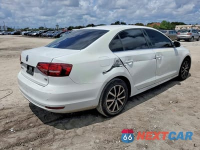 Trzecie zdjęcie samochodu z tyłu: 2017 VOLKSWAGEN JETTA SE VIN:3VWDB7AJ4HM398301 - miniatura