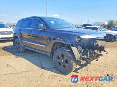 Czwarte zdjęcie samochodu z boku: 2011 JEEP GRAND CHEROKEE LAREDO VIN:1J4RR4GG3BC532555 - miniatura