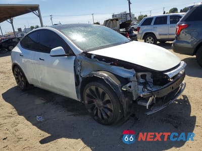 Czwarte zdjęcie samochodu z boku: 2022 TESLA MODEL Y VIN:7SAYGDEF0NF397305 - miniatura