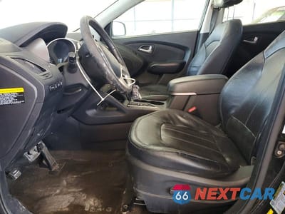 Zdjęcie 7 z 12 samochodu: 2012 HYUNDAI TUCSON LIMITED VIN:KM8JUCAC6CU514401 - miniatura