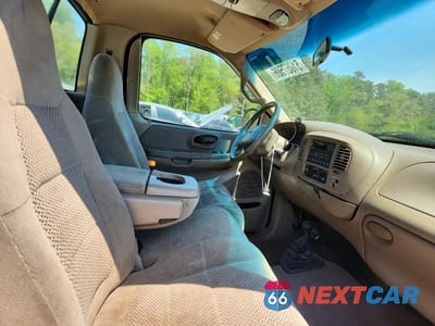 Zdjęcie 10 z 12 samochodu: 2001 FORD F150 VIN:1FTRF18L11NB46258 - miniatura