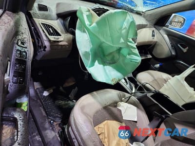 Zdjęcie 8 z 13 samochodu: 2011 HYUNDAI TUCSON GLS VIN:KM8JUCAC0BU200676 - miniatura
