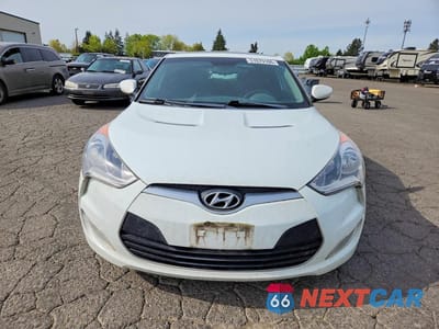 Piąte zdjęcie samochodu w środku: 2013 HYUNDAI VELOSTER BASE VIN:KMHTC6AD7DU085356 - miniatura