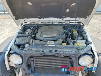 Zdjęcie 11 z 13 samochodu: 2013 JEEP WRANGLER UNLIMITED SAHARA VIN:1C4HJWEG2DL601987 - miniatura