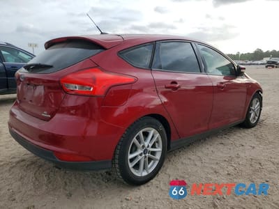 Trzecie zdjęcie samochodu z tyłu: 2016 FORD FOCUS SE VIN:1FADP3K27GL250377 - miniatura