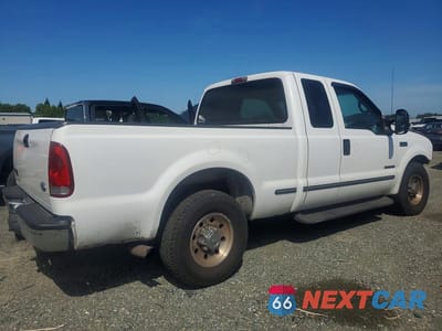 Trzecie zdjęcie samochodu z tyłu: 1999 FORD F250 SUPER DUTY VIN:1FTNX20FXXEC76510 - miniatura