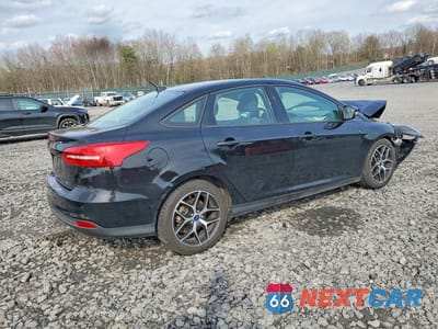 Trzecie zdjęcie samochodu z tyłu: 2017 FORD FOCUS SEL VIN:1FADP3H28HL207868 - miniatura