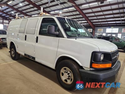 Czwarte zdjęcie samochodu z boku: 2014 CHEV EXPRESS G2500 VIN:1GCWGFCA4E1123119 - miniatura