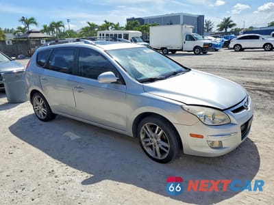 Czwarte zdjęcie samochodu z boku: 2012 HYUNDAI ELANTRA TOURING SE VIN:KMHDC8AE2CU135118 - miniatura