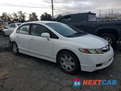 Czwarte zdjęcie samochodu z boku: 2009 HONDA CIVIC LX VIN:2HGFA16529H309222 - miniatura
