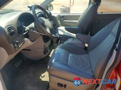 Zdjęcie 7 z 13 samochodu: 2005 DODGE GRAND CARAVAN SXT VIN:2D4GP44L25R345410 - miniatura
