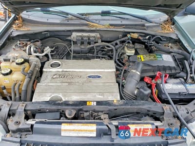 Zdjęcie 12 z 13 samochodu: 2005 FORD ESCAPE HEV VIN:1FMCU96H55KE18144 - miniatura