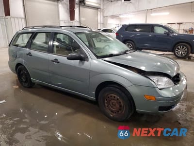 Czwarte zdjęcie samochodu z boku: 2005 FORD FOCUS ZXW VIN:1FAFP36N35W179347 - miniatura