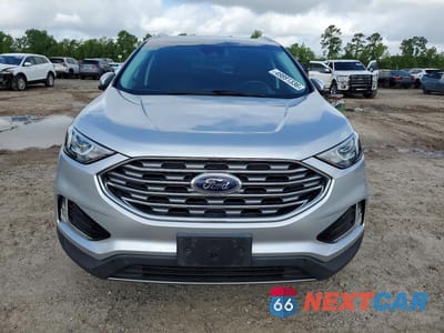 Piąte zdjęcie samochodu w środku: 2019 FORD EDGE TITANIUM VIN:2FMPK3K96KBB42727 - miniatura