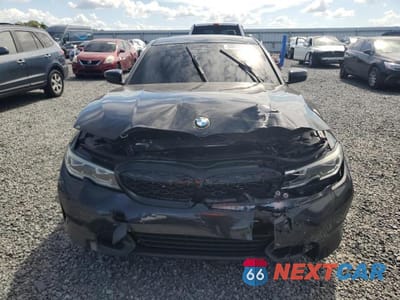Piąte zdjęcie samochodu w środku: 2019 BMW 330I VIN:WBA5R1C57KAK10808 - miniatura