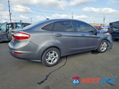 Trzecie zdjęcie samochodu z tyłu: 2014 FORD FIESTA SE VIN:3FADP4BJXEM190233 - miniatura