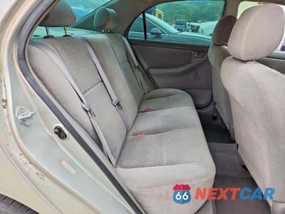 Zdjęcie 10 z 11 samochodu: 2003 TOYOTA COROLLA CE VIN:JTDBR32E730043246 - miniatura