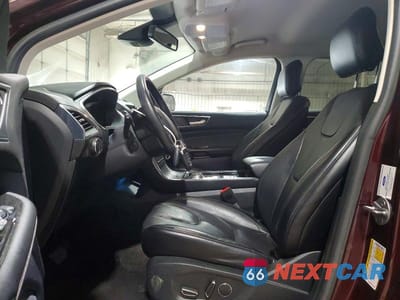 Zdjęcie 7 z 14 samochodu: 2019 FORD EDGE TITANIUM VIN:2FMPK4K97KBC14606 - miniatura