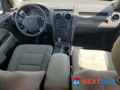 Zdjęcie 8 z 13 samochodu: 2008 FORD TAURUS X SEL VIN:1FMDK05W38GA36790 - miniatura