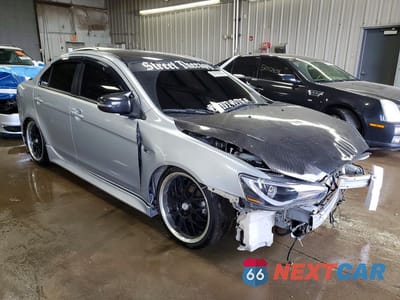 Czwarte zdjęcie samochodu z boku: 2015 MITSUBISHI LANCER ES VIN:JA32U2FU1FU013360 - miniatura