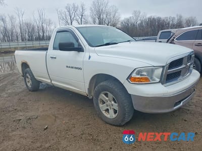 Czwarte zdjęcie samochodu z boku: 2012 DODGE RAM 1500 SLT VIN:3C6JD7EP1CG185884 - miniatura