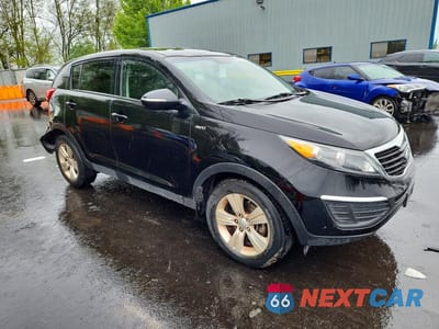 Czwarte zdjęcie samochodu z boku: 2012 KIA SPORTAGE LX VIN:KNDPBCA24C7216438 - miniatura