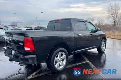 Czwarte zdjęcie samochodu z boku: 2015 RAM 1500 SLT VIN:3C6RR7LT1FG654271 - miniatura