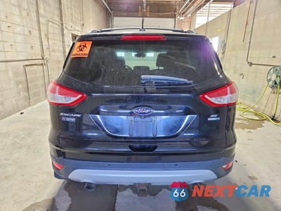 Zdjęcie 6 z 13 samochodu: 2016 FORD ESCAPE SE VIN:1FMCU9G95GUC47121 - miniatura