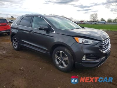 Czwarte zdjęcie samochodu z boku: 2020 FORD EDGE SEL VIN:2FMPK4J93LBB23092 - miniatura
