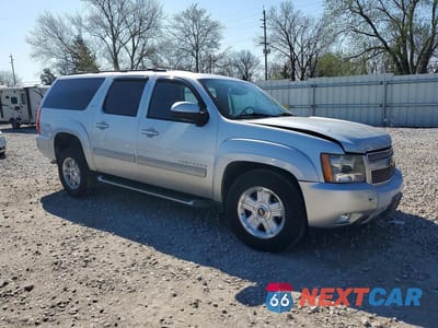 Czwarte zdjęcie samochodu z boku: 2010 CHEVROLET SUBURBAN C1500 LT VIN:1GNUCJE01AR247863 - miniatura