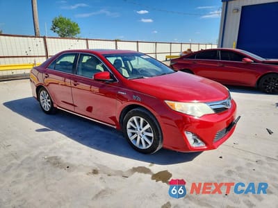 Czwarte zdjęcie samochodu z boku: 2012 TOYOTA CAMRY HYBRID XLE VIN:4T1BD1FK5CU018207 - miniatura