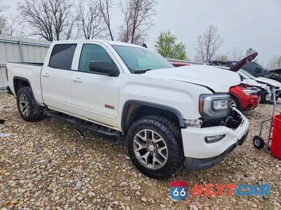 Czwarte zdjęcie samochodu z boku: 2018 GMC SIERRA K1500 SLT VIN:3GTU2NEC7JG120628 - miniatura