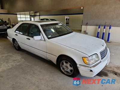 Czwarte zdjęcie samochodu z boku: 1999 MERCEDES-BENZ S 320W VIN:WDBGA32G3XA431782 - miniatura