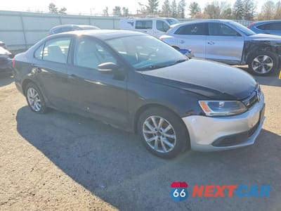 Czwarte zdjęcie samochodu z boku: 2011 VOLKSWAGEN JETTA SE VIN:3VWDZ7AJ5BM088385 - miniatura