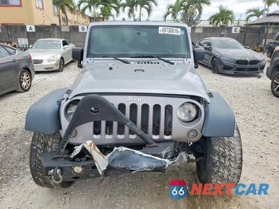 Piąte zdjęcie samochodu w środku: 2018 JEEP WRANGLER UNLIMITED SPORT VIN:1C4HJWDG6JL928972 - miniatura