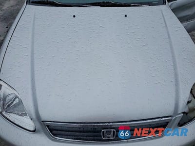 Zdjęcie 12 z 13 samochodu: 1999 HONDA CIVIC DX VIN:2HGEJ6347XH106263 - miniatura