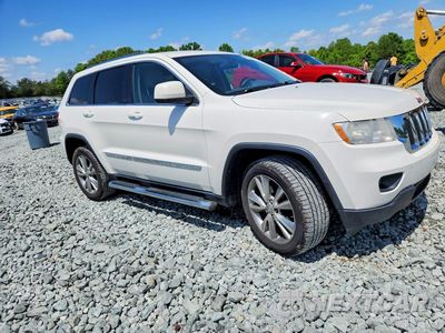 Czwarte zdjęcie samochodu z boku: 2012 JEEP GRAND CHEROKEE LAREDO VIN:1C4RJFAG2CC294099 - miniatura