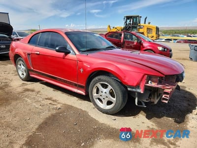 Czwarte zdjęcie samochodu z boku: 2002 FORD MUSTANG VIN:1FAFP404X2F208182 - miniatura