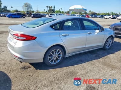 Trzecie zdjęcie samochodu z tyłu: 2017 FORD FUSION SE HYBRID VIN:3FA6P0LU1HR266116 - miniatura