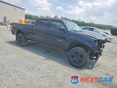Czwarte zdjęcie samochodu z boku: 2010 TOYOTA TACOMA DOUBLE CAB VIN:3TMMU4FN3AM018278 - miniatura