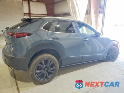 Trzecie zdjęcie samochodu z tyłu: 2024 MAZDA CX-30 PREFERRED VIN:3MVDMBCM4RM614316 - miniatura