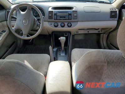 Zdjęcie 8 z 12 samochodu: 2003 TOYOTA CAMRY LE VIN:JTDBE32K730146698 - miniatura