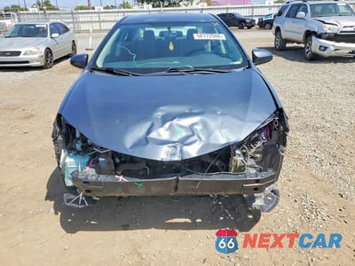 Piąte zdjęcie samochodu w środku: 2016 TOYOTA COROLLA L VIN:5YFBURHE7GP391682 - miniatura