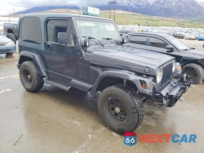 Czwarte zdjęcie samochodu z boku: 2000 JEEP WRANGLER / TJ SAHARA VIN:1J4FA59S2YP786874 - miniatura
