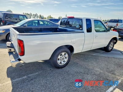 Trzecie zdjęcie samochodu z tyłu: 1999 NISSAN FRONTIER XE VIN:1N6DD26S8XC323177 - miniatura