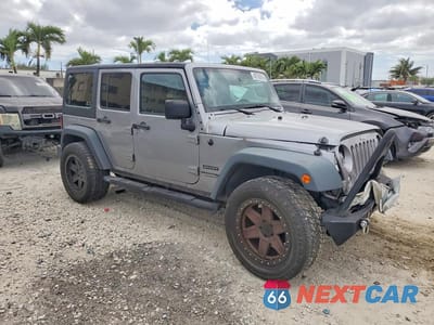 Czwarte zdjęcie samochodu z boku: 2018 JEEP WRANGLER UNLIMITED SPORT VIN:1C4HJWDG6JL928972 - miniatura